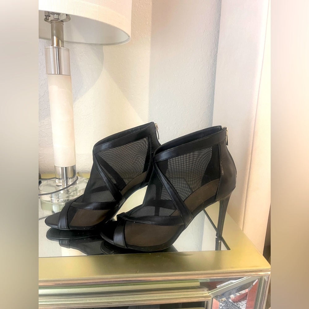 Brand new black heals, beautiful.